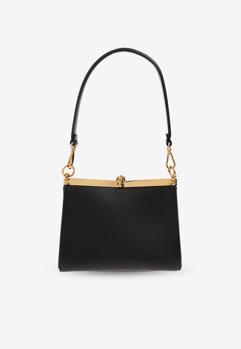 Mini Vela Leather Crossbody Bag