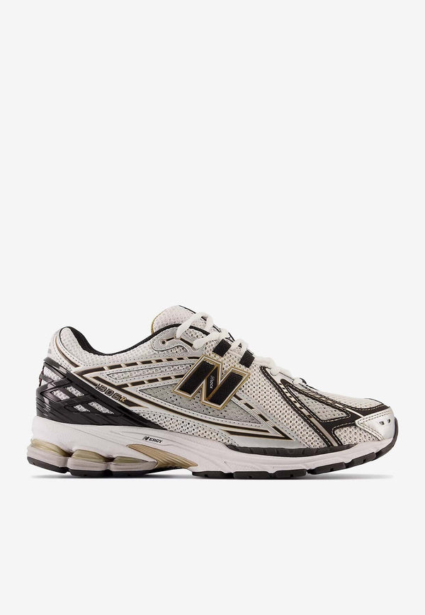 1906R Low-Top Sneakers in Metallic Silver with Metallic Gold