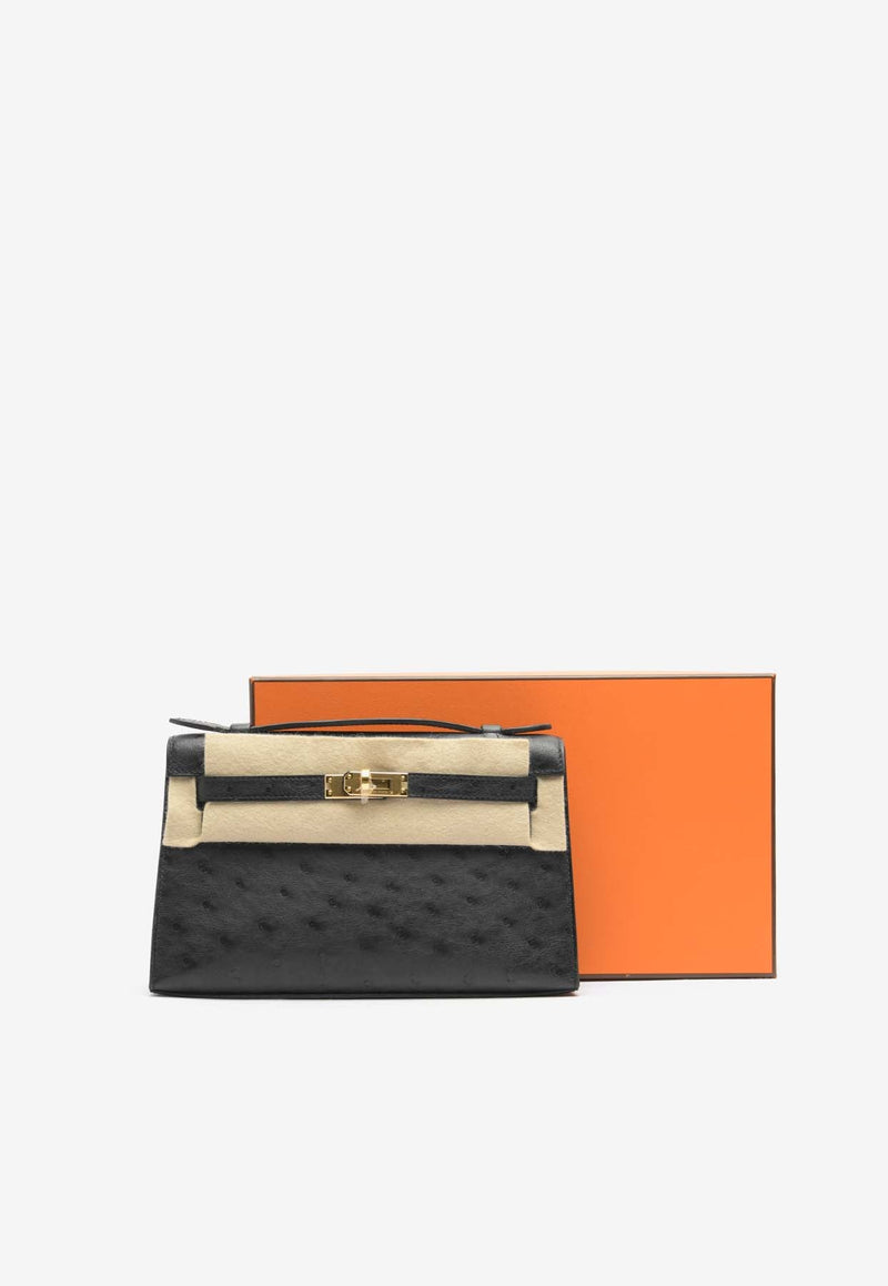 Kelly Pochette Clutch Bag in Black Ostrich Leather with Gold Hardware