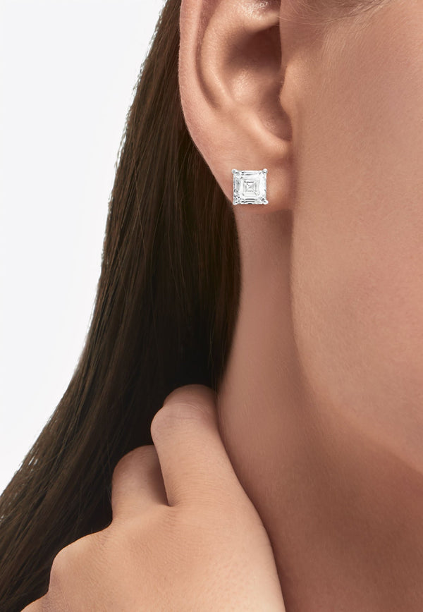 Emerald Cut Diamond Stud Earrings in Platinum and White-Gold